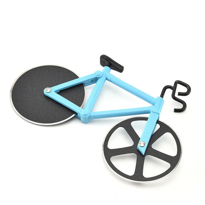 Bicycle-shaped pizza cutter with stainless steel blade and hand-grip handle on a cutting board