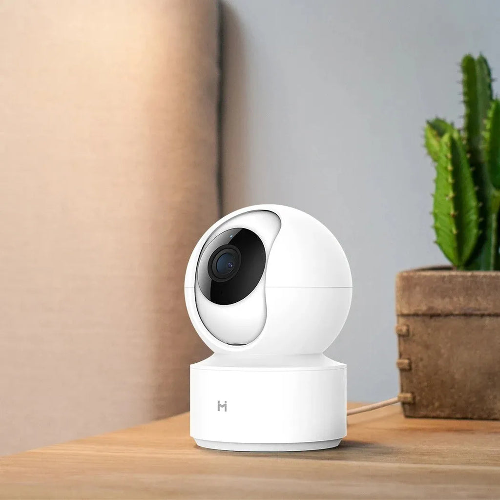 White Xiaobai Smart Camera indoor security unit showing lens and compact design.