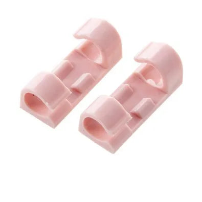 Pack of self-adhesive plastic cable organiser clips in various colours on a surface.