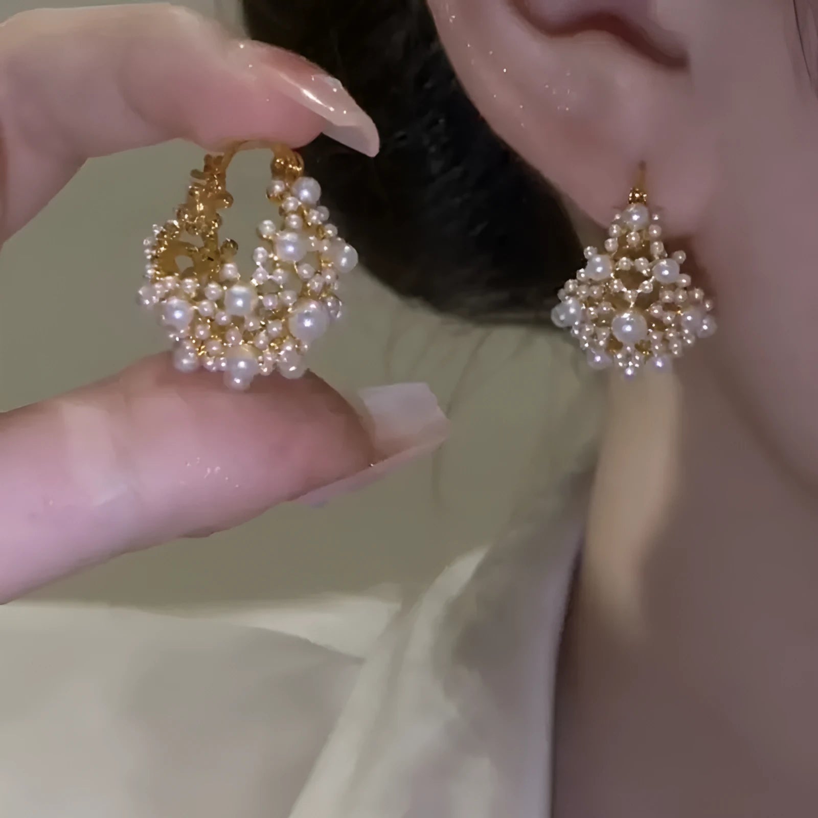 Gold floral basket earrings with pearl inlay detail on rice-shaped beads