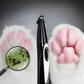 Black pet hair clippers with ceramic blade and USB charging, ABS plastic body, 300mA current.