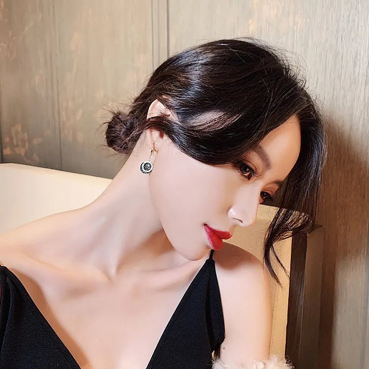 Black geometric round alloy earrings with retro Hong Kong style, showing 3.6cm drop length.