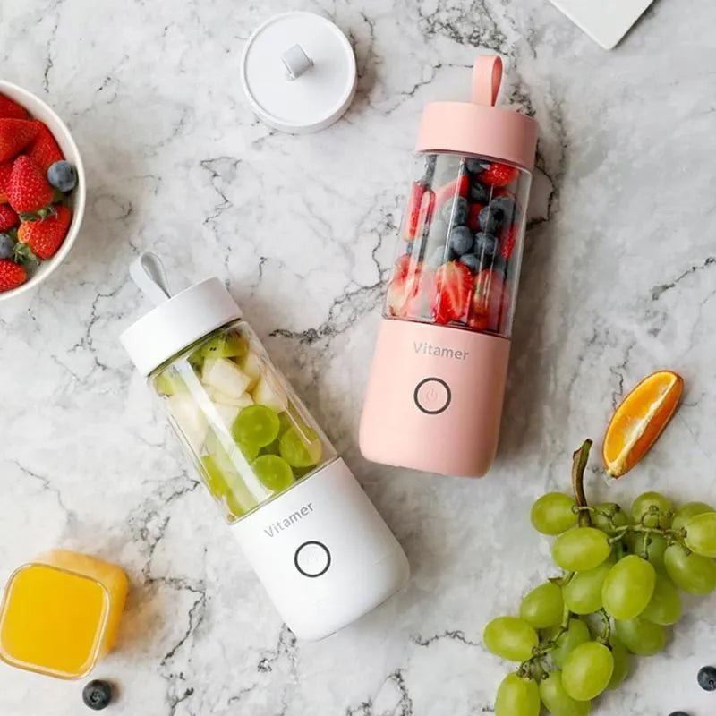 White portable USB rechargeable blender bottle with silicone carry ring, 350ml Tritan cup, and stainless steel blades.