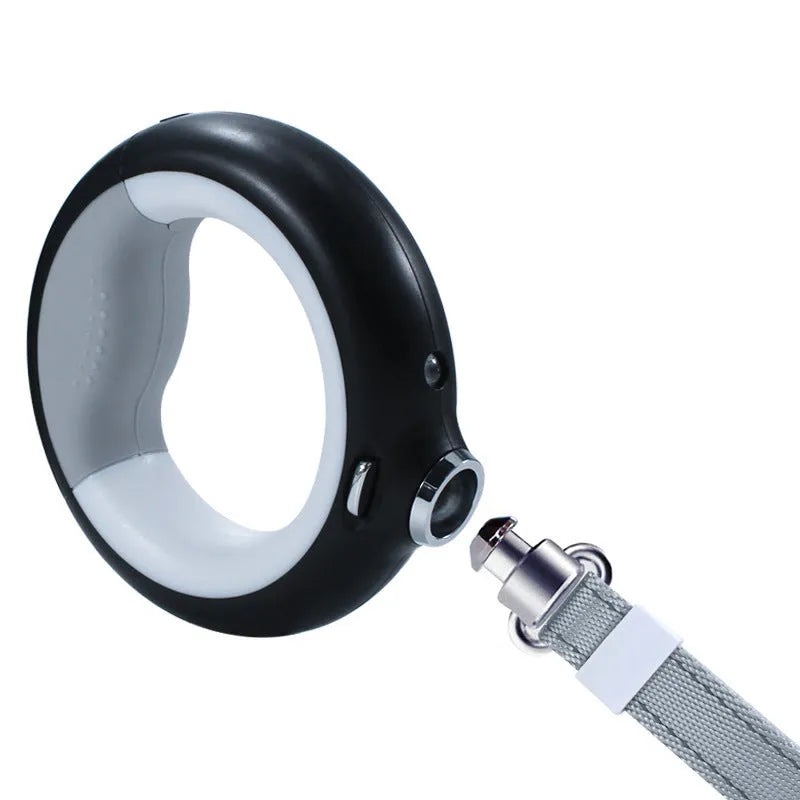 Luminous automatic telescopic dog rope lamp with LED light, black, shown on a pink background