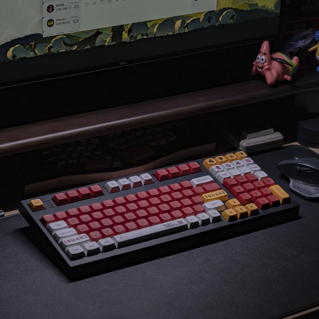 138 PBT sublimation keycaps in a boy and girl colour matching design laid out on a table.