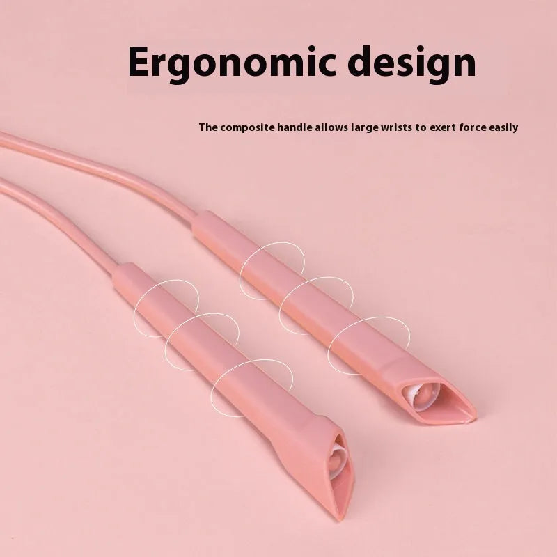 Plastic handle fitness skipping rope in multiple colour options including blue, black and pink.