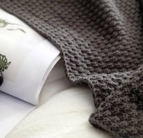 Nordic fringed knit ball blanket in acrylic measuring 130×170cm in beige colour