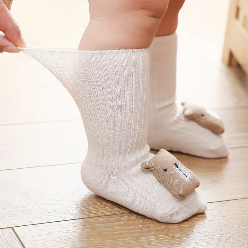 Baby socks with silicone anti-slip grips on sole, mid-height tube design in combed cotton