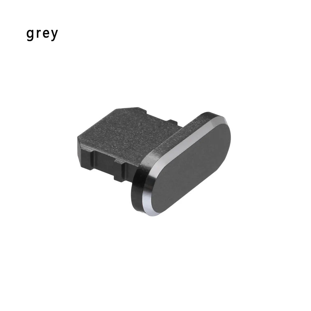 Aluminium alloy iPhone charging port dust plug in gold, silver, blue, red, grey, black, and rose gold colours.