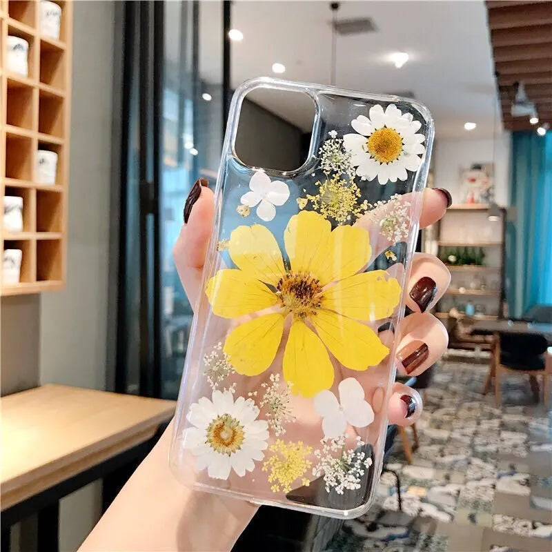 Pink and yellow floral print TPU back cover case for iPhone on a white background