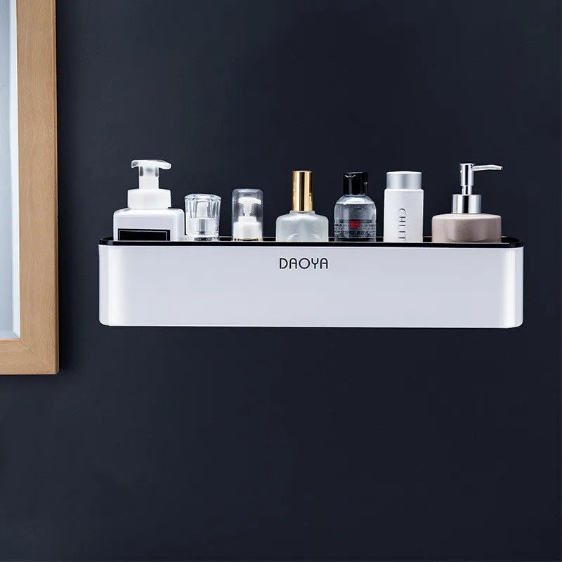 Plastic bathroom wall shelf with hole-free installation, shown holding shampoo and shower gel bottles.