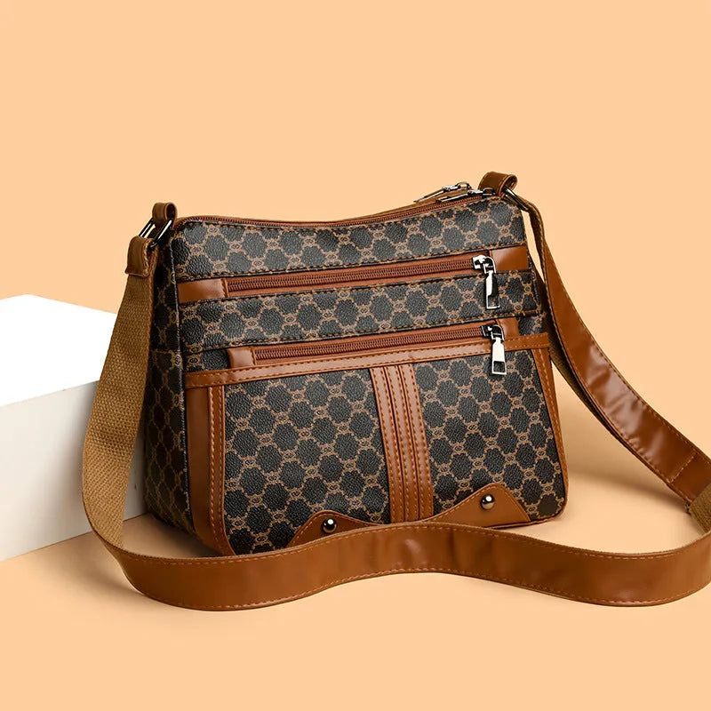 Brown stitching pattern women's crossbody bag made from PU leather with an adjustable strap.