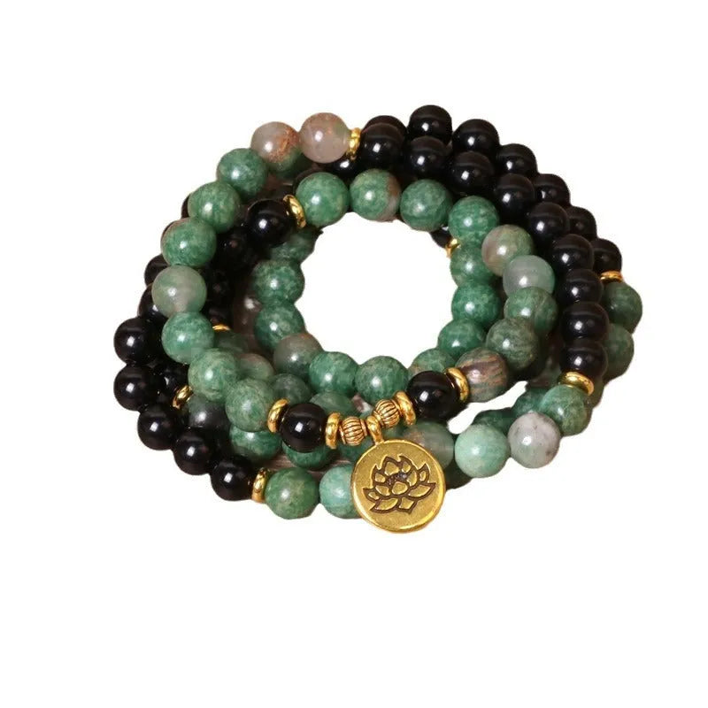 Green and black elastic beaded long bracelet with alloy beads on stretch cord