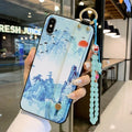 Rose flower patterned TPU phone case for iPhone with a wrist strap connector.