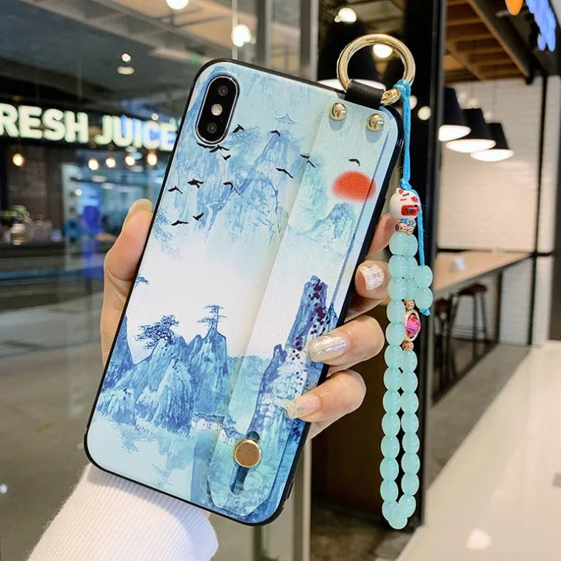 Rose flower patterned TPU phone case for iPhone with a wrist strap connector.