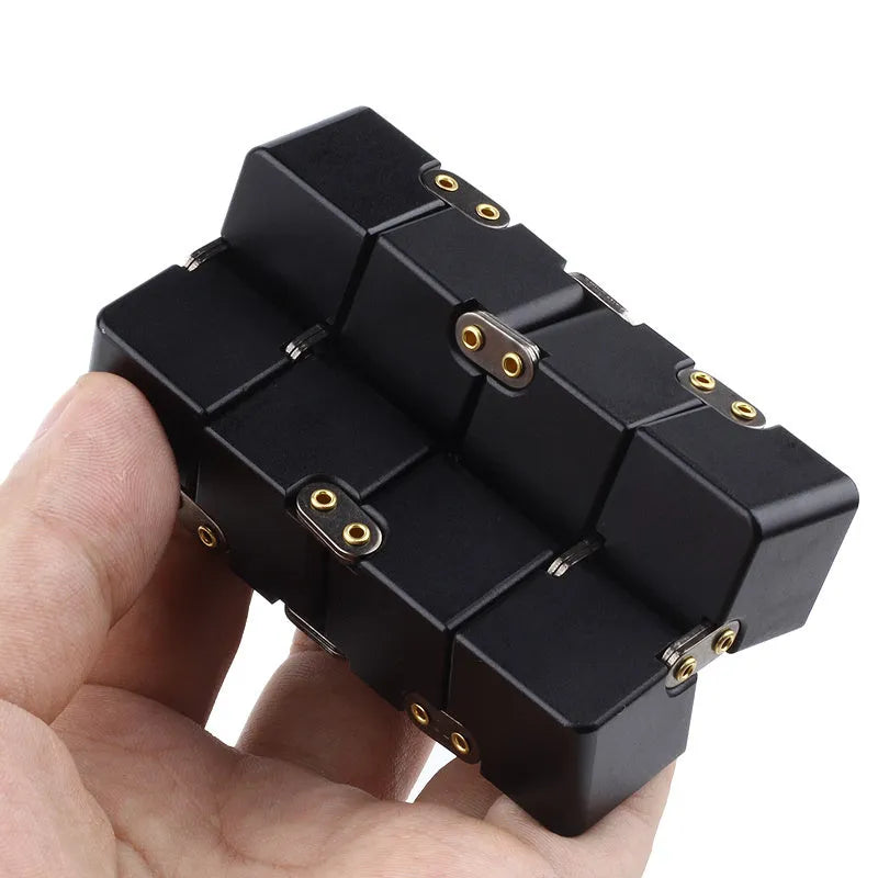 Zinc alloy infinity cube fidget toy in black finish showing rotating cube mechanism