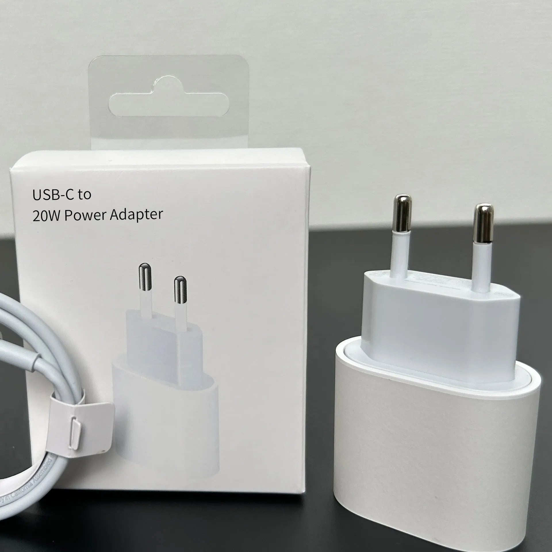 White 20W USB Type-C PD wall charger with set of five international travel plug adaptors