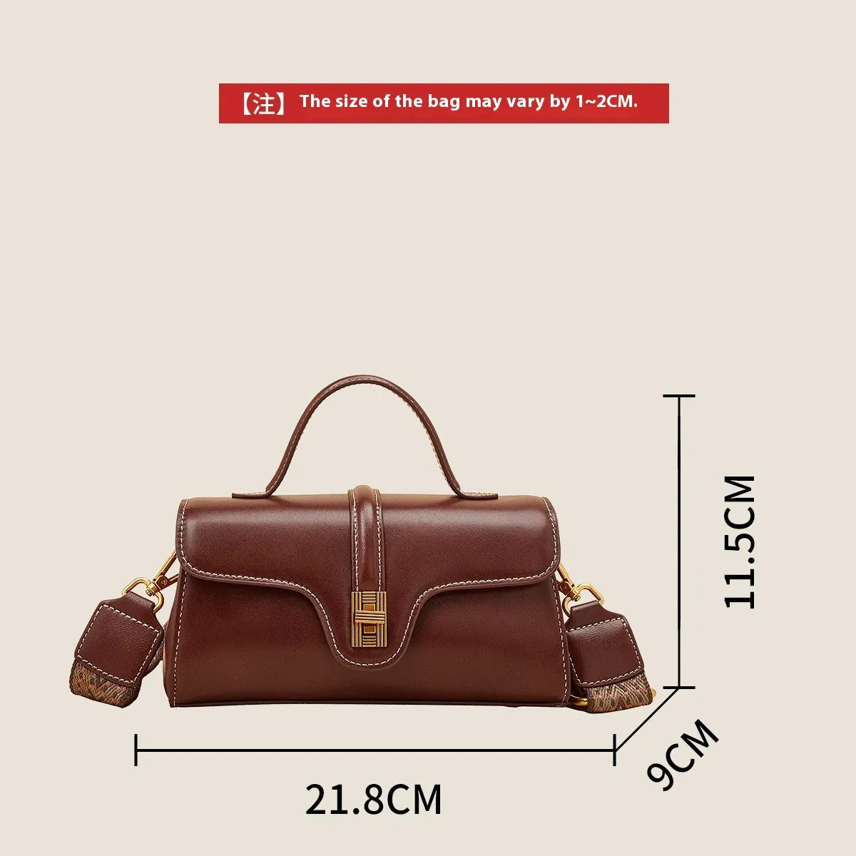 Cambridge-style leather messenger bag in clamshell design with lock detail and internal compartments