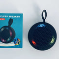 Pink mini Bluetooth speaker with plastic shell and button controls, 82x82x40mm
