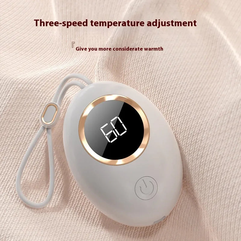 USB-powered hand warmer with digital display, showing girl pink colour option.
