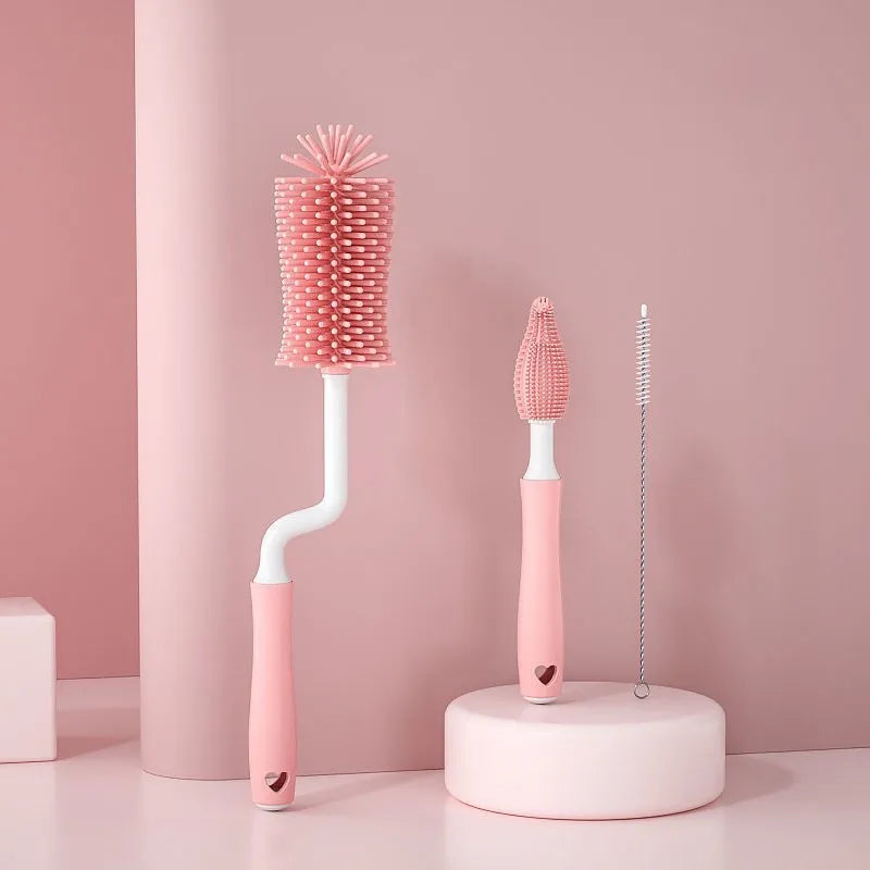 Baby silicone bottle brush set in pink, blue, and yellow for cleaning straws and nipples