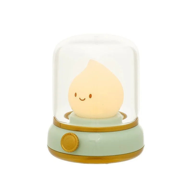 Green retro-style USB rechargeable LED night lamp with dimmer knob on wooden table