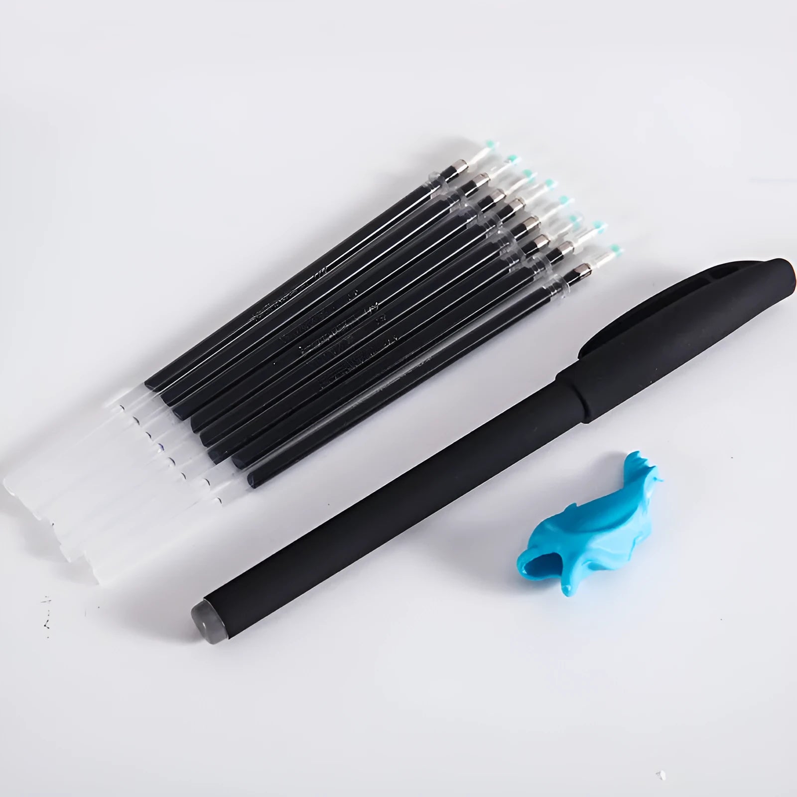 Automatic fade pen set showing pen holder, case, and eight refill units for temporary marking.