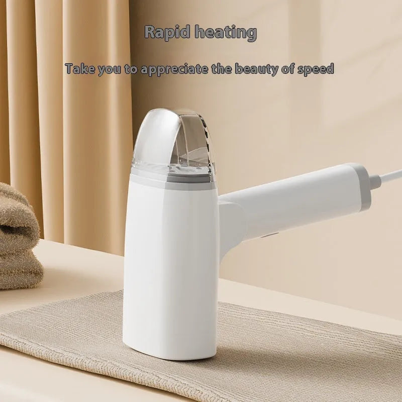 Blue and white handheld garment steamer with water tank and temperature control buttons