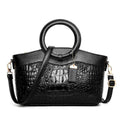 Fabric casual ladies shoulder bag in multiple colours showing zipper compartments and dimensions 31x21x13cm.