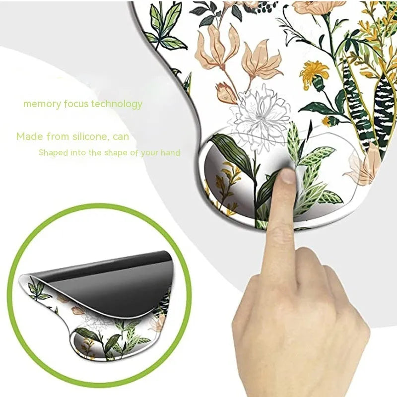 Black silicone keyboard wrist pad with floral pattern and non-slip rubber base