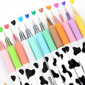 Box of 12 cow print gel pens with assorted colours and 0.38mm fine tips.