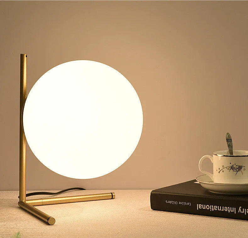Creative LED table lamp with glass shade in three size options and three-tone light adjustment