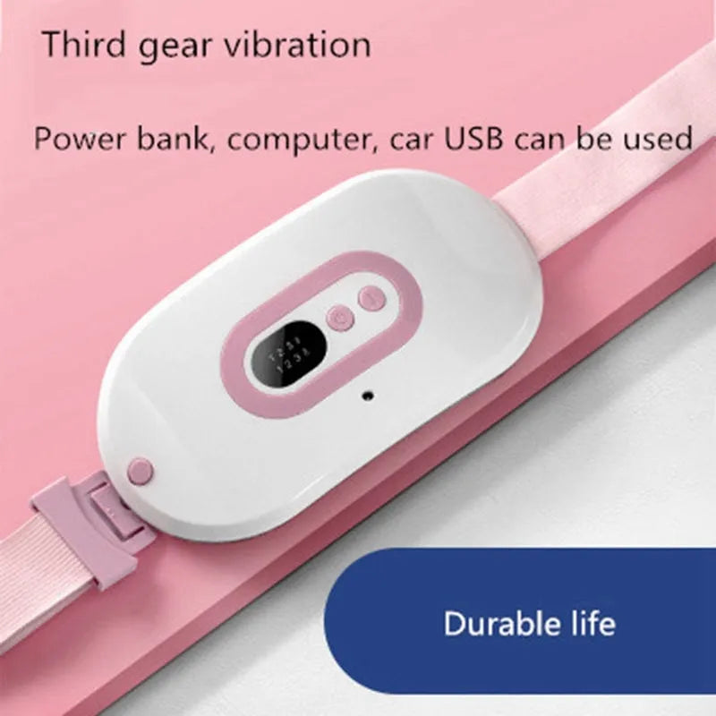 Pink rechargeable menstrual cramp relief belt with fabric wrap and button control, placed on a light background