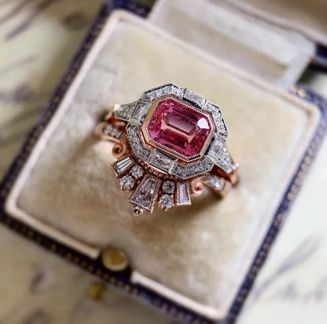 Rose gold geometric women's fashion ring in a retro style on a hand.
