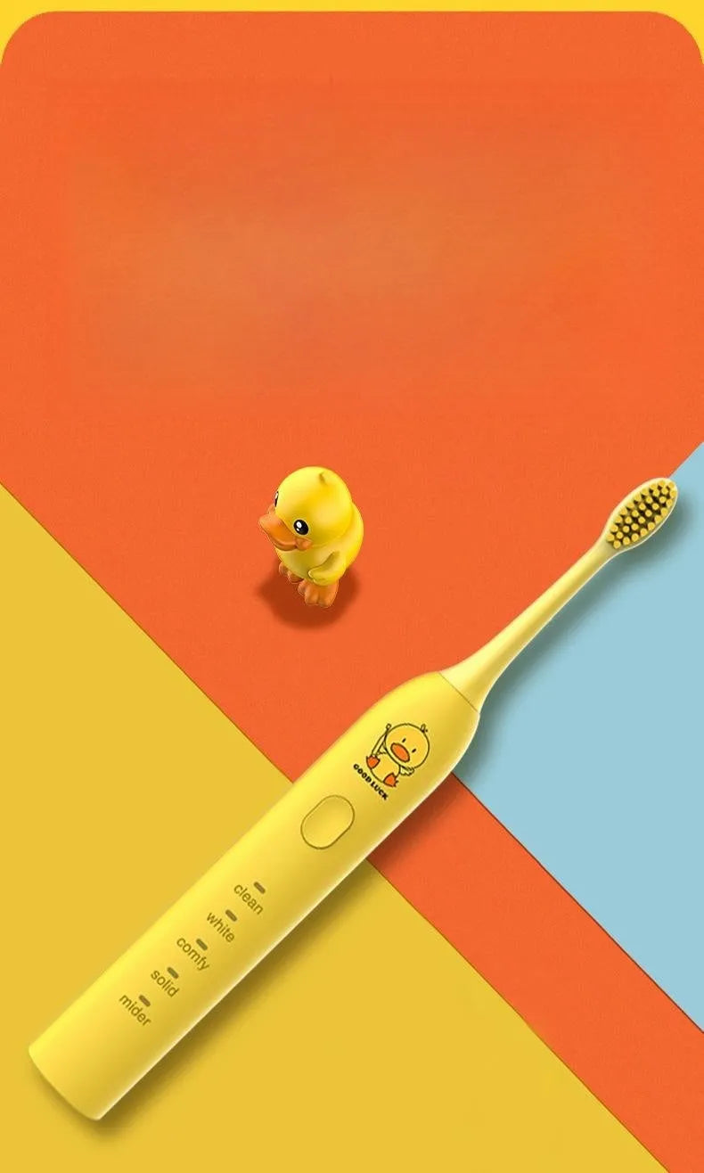 Small yellow duck design rechargeable electric toothbrush with soft bristles.
