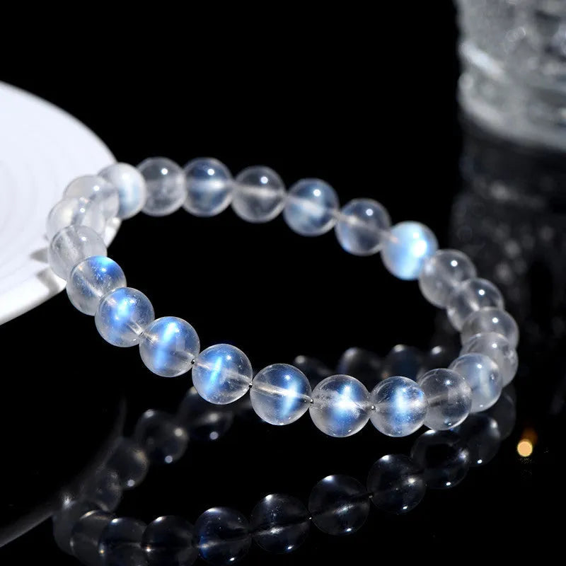 Natural cream body blue moonlight crystal bracelet showing grinding treatment details