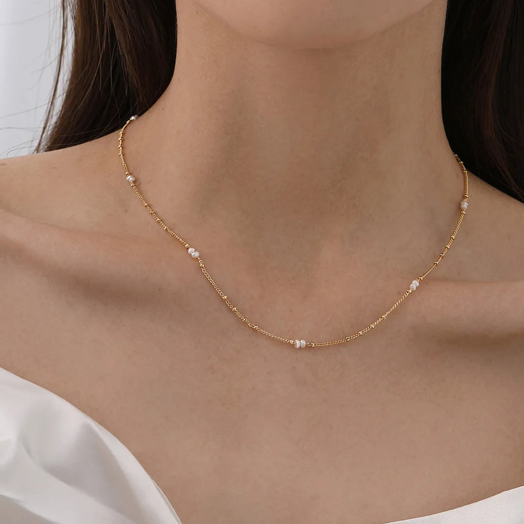 Hong Kong style necklace with natural pearl and shell pendant on stainless steel chain