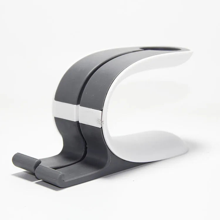 Grey and green Apple Watch iPhone charging stand showing dual-device desktop charging dock