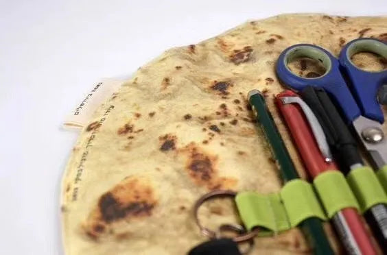 Novelty fabric pencil holder shaped like a burrito roll, 22cm square, in shown colour