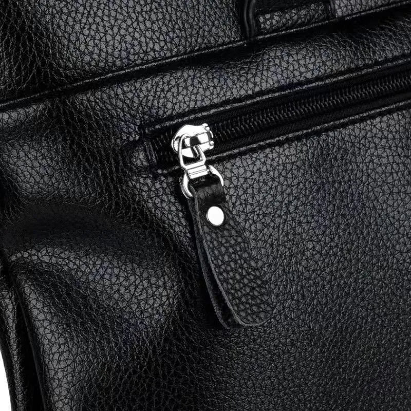 Men's black and brown PU leather shoulder messenger bag with splicing style, showing 35x30x4cm dimensions.