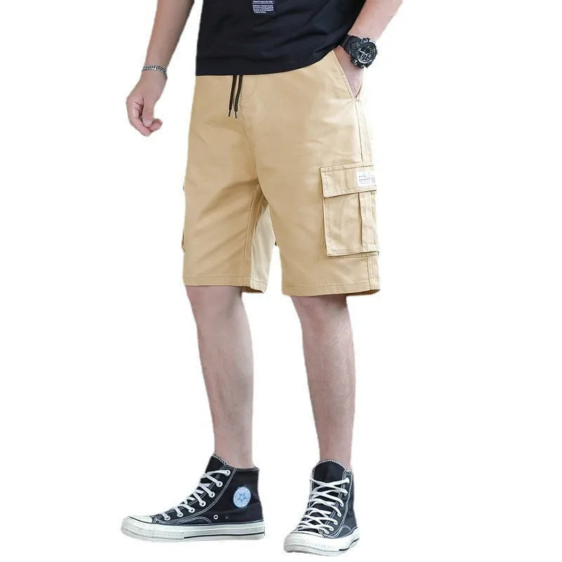 Men's loose Korean-style trousers in black, khaki, army green, and camouflage colours.