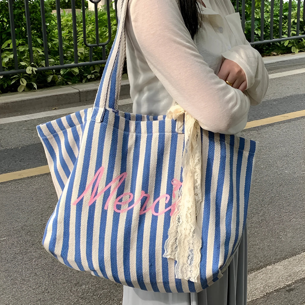 Blue and white striped cotton canvas bag with printed letters in a fresh, sweet style.