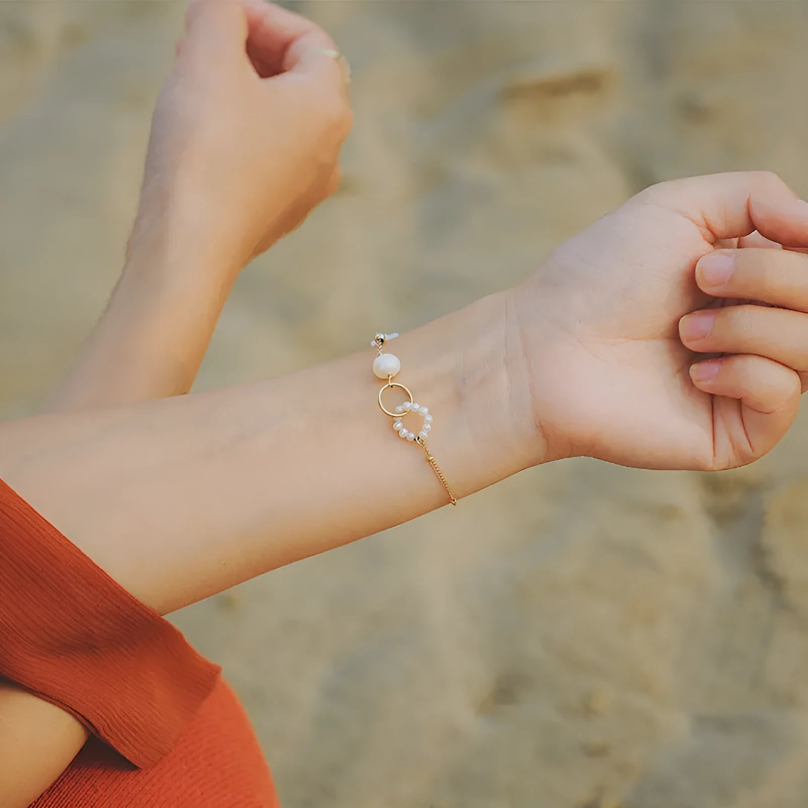 Women's natural pearl bracelet with 14k gold-plated setting.