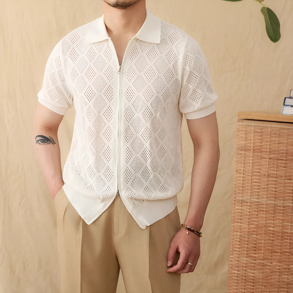 Men's light brown cotton cardigan with lapel collar, zipper front, and short sleeves laid flat.