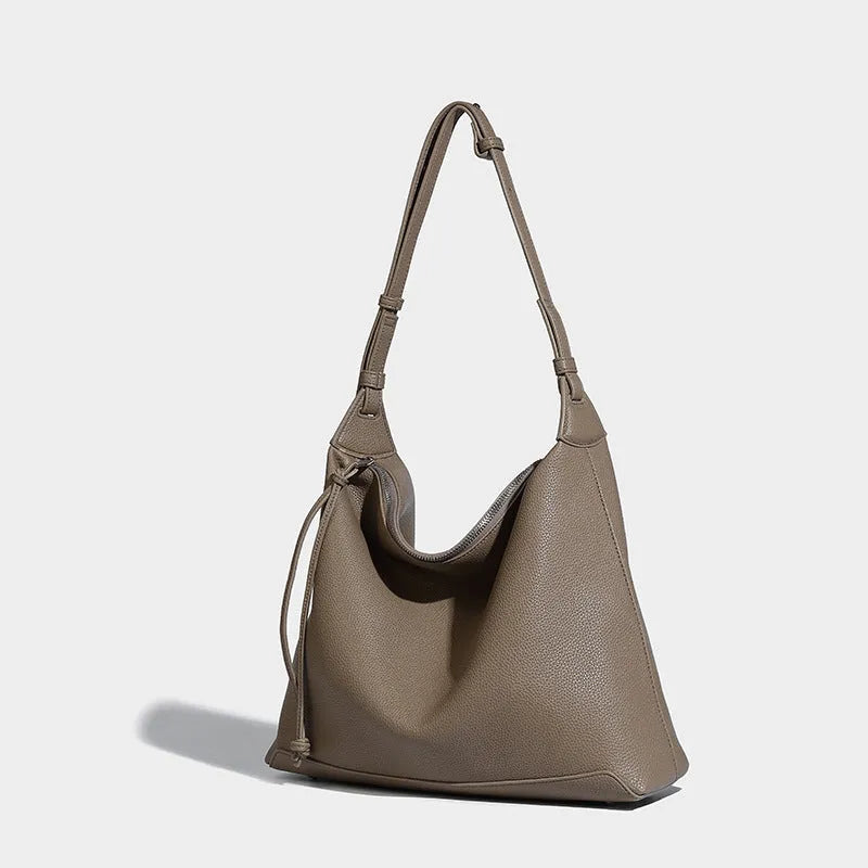 Soft PU leather large capacity messenger bag in caramel colour showing 36cm length dimensions