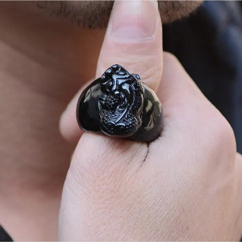 Men's domineering obsidian Pixiu thumb ring with natural gold sheen on an alloy band.