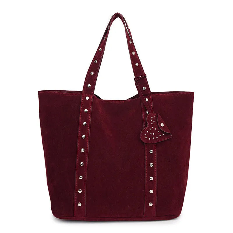 Women's black PU leather tote bag with double shoulder straps showing sandwich pocket detail