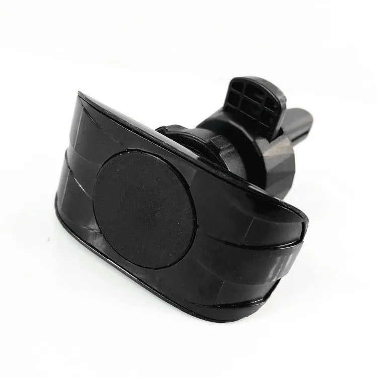 Black car phone holder clipped to vehicle air vent holding smartphone for navigation