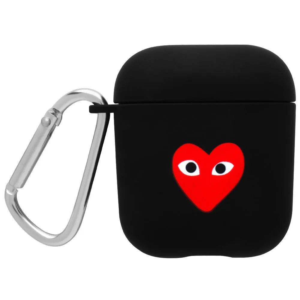 Black and pink polycarbonate AirPods case covers with decorative flower and smiley face back designs.