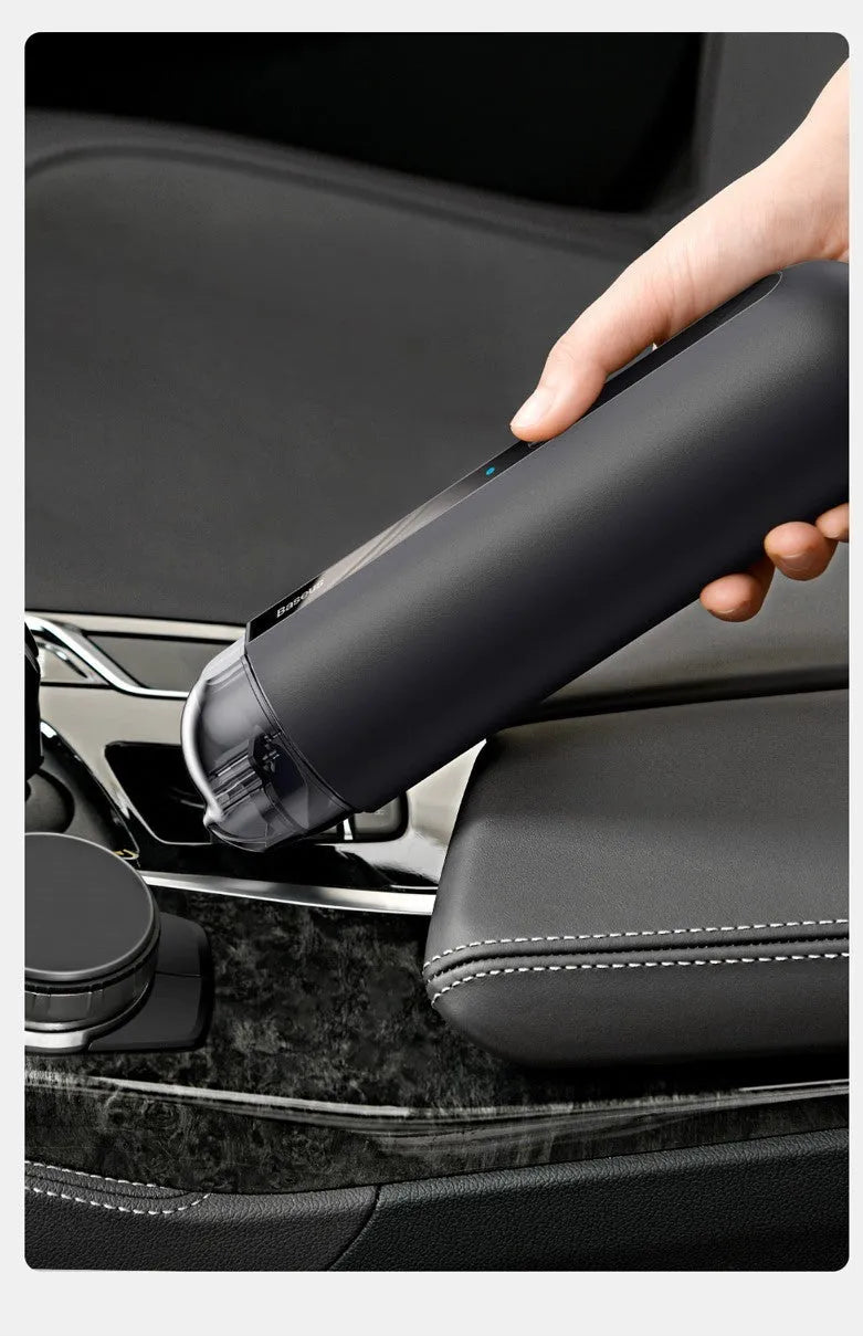 Baseus handheld cordless car vacuum cleaner with blowing hose, shown in black next to its 60ml dust cup.